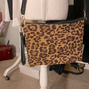 Leopard crossbody or wristlet.